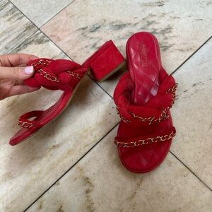 CHANEL Red Sandals with Gold Chain Accent